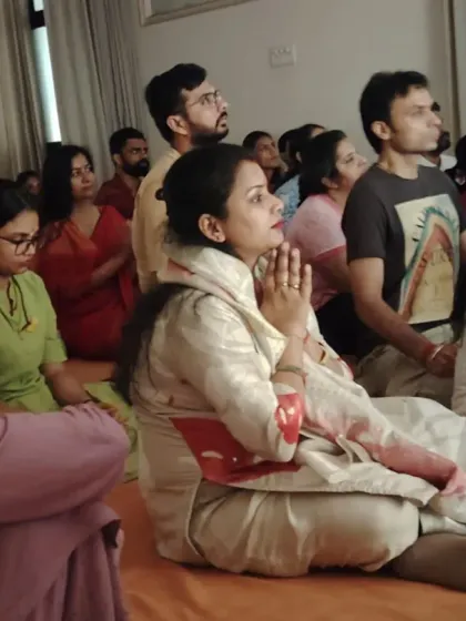 A seeker with hands in prayer during the Guru Purnima gathering. The space was filled with grace, love, and the palpable presence of the Guru and the Divine.