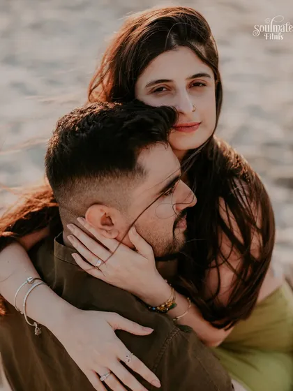 A tender embrace against the backdrop of the setting sun in Dubai. This shot is about safety, comfort, and finding home in each other's arms. My pre-wedding photography aims to capture the feeling of your relationship, not just the look.