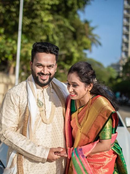 A sweet portrait of a Maharashtrian couple, capturing their gentle and happy interaction.