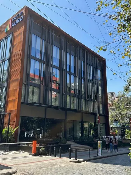 We designed this contemporary commercial building on Church Street, Bangalore, using a bold Corten steel and glass facade to create a landmark property for retail and workspace environments.