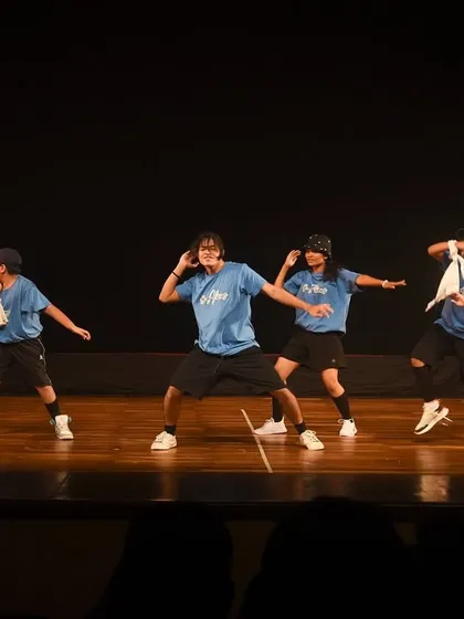 A smaller group of hip-hop dancers showcases their individual styles within a group formation. We encourage personal expression while maintaining the cohesiveness of the crew.