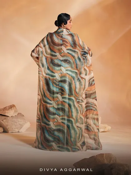 The back view of the Adoree Cape Set, highlighting the full expanse of the alluring printed organza cape.
