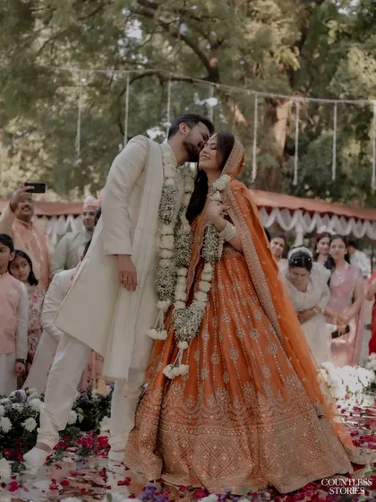 In a shower of petals and blessings, this is the moment that feels like a pause in time. It’s the unscripted, heartfelt kiss during the ceremony that speaks volumes. I live for capturing these real, candid expressions of love that become the most cherished memories of your wedding day.