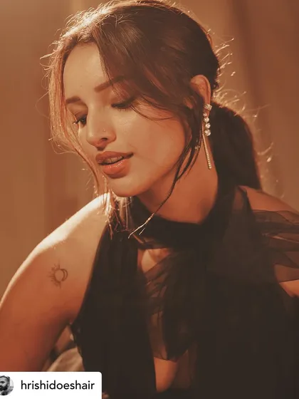 Another beautiful shot of Tripti Dimri. Her subtle, cool brown hair color looks elegant and timeless.