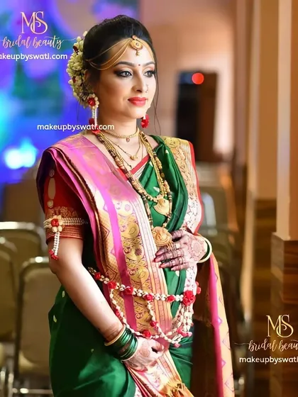 This is the radiant look I created for a traditional Godh Bharai, or baby shower ceremony. I focused on creating flawless, glowing skin, classic red lips, and an elegant hair updo with a gajra to celebrate this beautiful milestone.