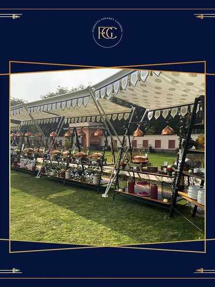 A wide-angle view of our expansive outdoor buffet line, showcasing the scale and meticulous organization we bring to large-scale event catering.