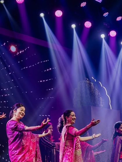 A graceful performance by the ladies of the family. The smiles on their faces show how much fun they're having.