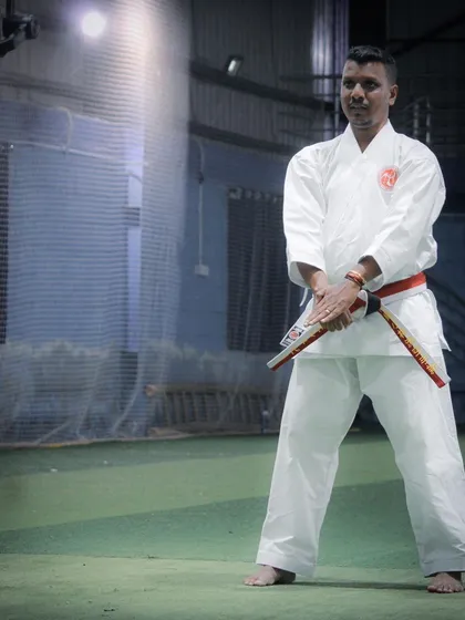 As chief instructor, I ensure our weapons training is authentic, safe, and builds true martial arts proficiency, as seen here with the Nunchaku.