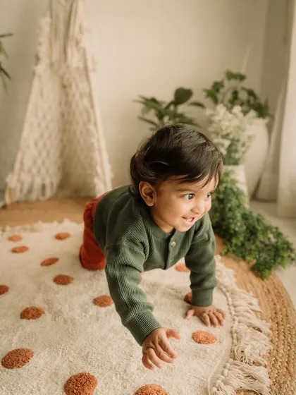 On the move! A candid crawling shot of this little adventurer exploring the studio.