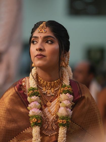 A candid moment from a wedding ceremony. My makeup is designed to look beautiful from every angle and hold up through emotional moments, ensuring the bride looks perfect throughout her special day.