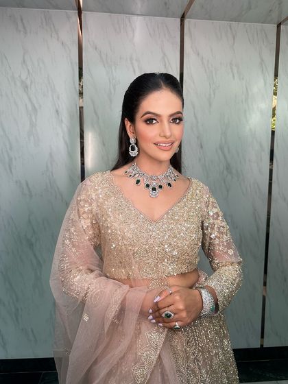 A confident and happy bride, ready for her engagement ceremony.