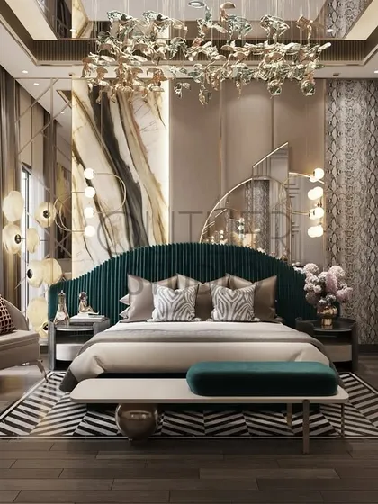A dreamy escape where comfort meets luxury. This bedroom features a statement bed-back wall layered with mirrors, Italian marble, and fabric. The intricately patterned flooring adds a bold design statement.