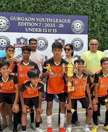 The full squad of the U13 GYL champions with parents and coaches. A true team effort on and off the pitch.