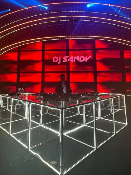 A look at my stage setup for a destination wedding in Vietnam. I use top-of-the-line equipment and work with event planners to create a visually stunning console and lighting design that matches the scale of the celebration.