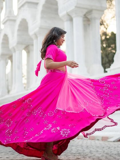 We love to see you play dress up in our clothes. This Barbie pink lehenga is perfect for a sangeet or mehendi.