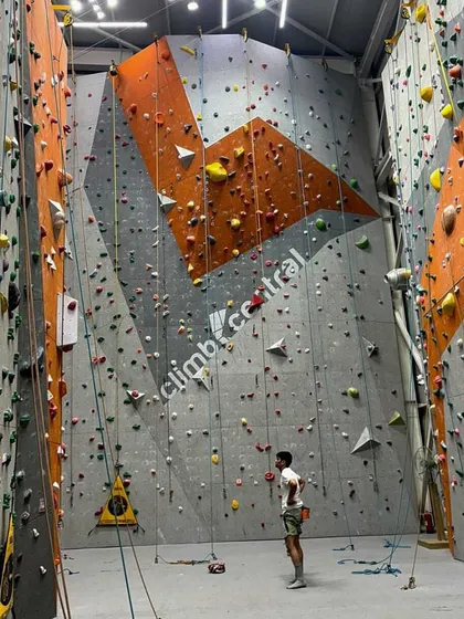 A lone climber surveys the wall before our 5th Anniversary team-based competition. The calm before the storm of excitement.