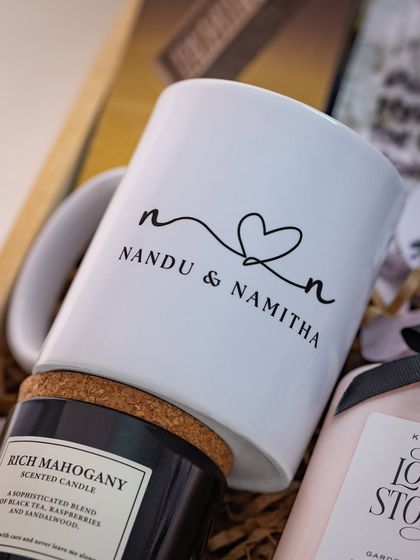A close-up of the custom-printed mug, showing the simple yet elegant design that celebrates the couple's union.