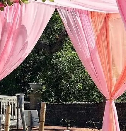 A close-up of the beautiful draping on the mandap pillars. I use high-quality fabrics in colors that match the floral theme to add softness and elegance to the overall structure.
