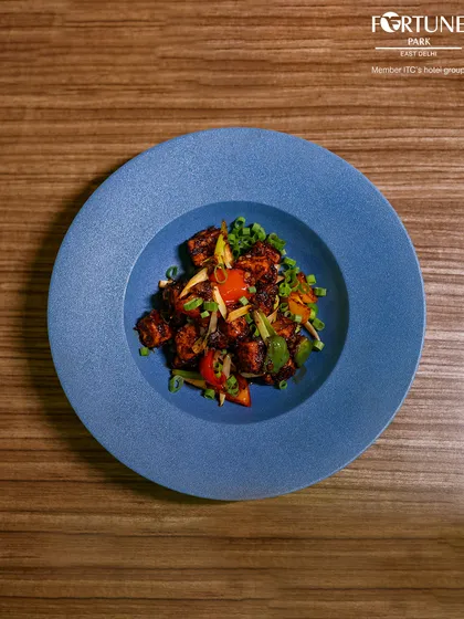 Another angle of our flavorful Chilli Paneer, a perfect example of the delicious Indo-Chinese cuisine we offer.