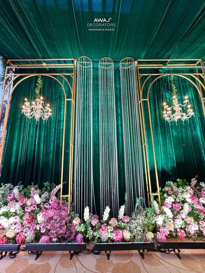 A view of the walkway wall, showing the beautiful interplay of light, flowers, and textures.