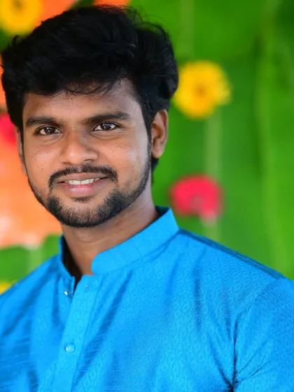 A close-up portrait from the Haldi celebration.