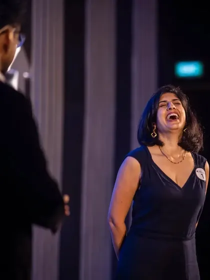 The beautiful, uninhibited laughter of a guest on stage with me. Audience participation is at the heart of my shows, creating unforgettable and hilarious memories.