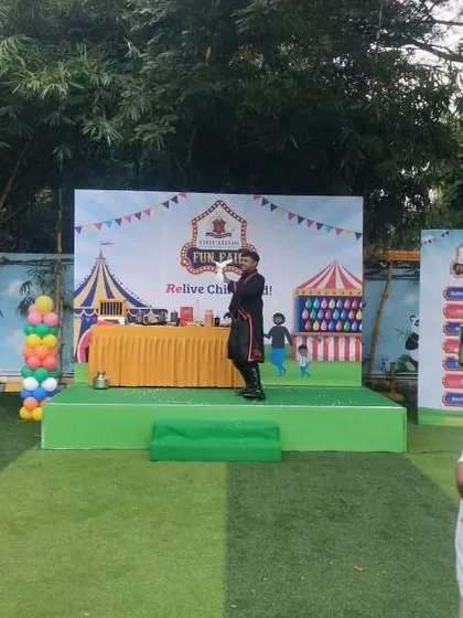 On stage at the Orchids The International School 'Fun Fair'. School carnivals and fairs are the perfect setting for my energetic and visual magic.