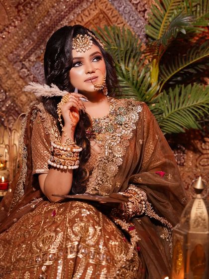 An elegant Arabic bridal look created by one of my students. The warm, bronze tones and elaborate jewelry are key features of this style, which we cover in our professional makeup diploma.