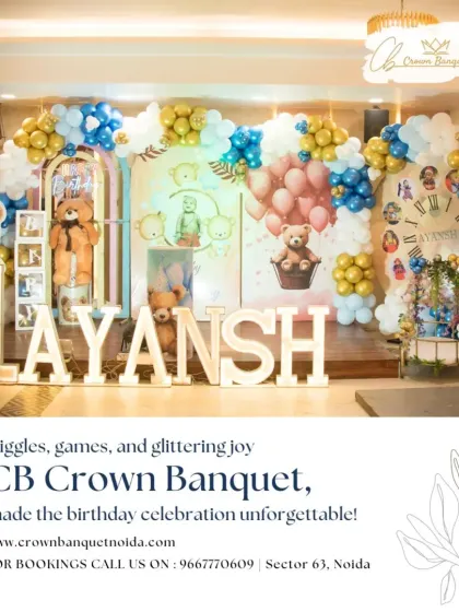 A teddy bear themed first birthday setup. The elaborate balloon arch, cute bear figures, and personalized light-up name sign create a warm and adorable setting for this special milestone.
