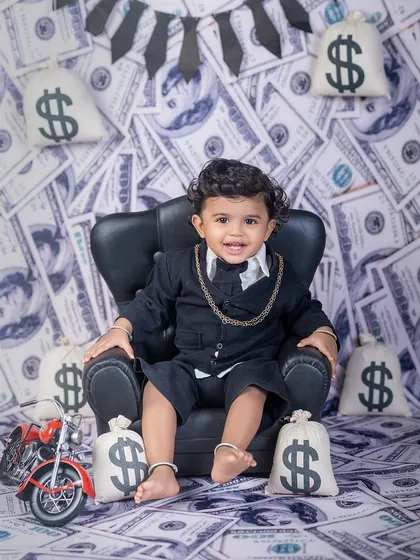 Meet the little boss man! My "Boss Baby" theme is always a hit, perfect for capturing that big personality in a tiny package. With a custom money-themed backdrop and props, we create memories that are both fun and unforgettable.