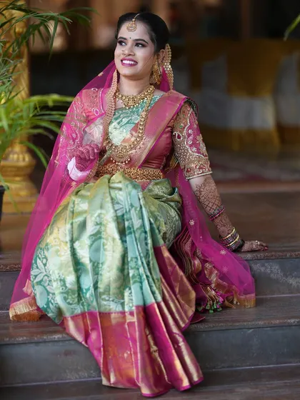 A candid, happy portrait of the bride looking away with a natural smile. I aim to capture these relaxed moments throughout the wedding day.