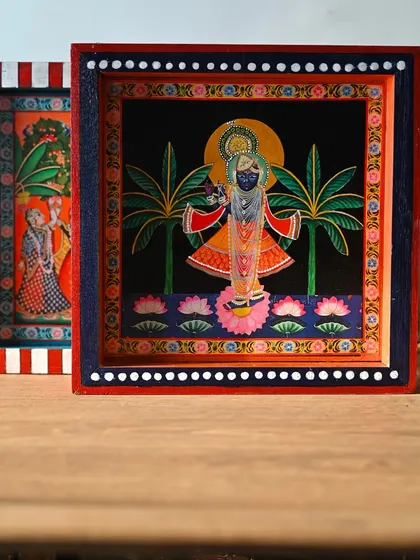 Another view of the Shrinathji block, showing its deep, shadow-box style construction and hand-painted border.