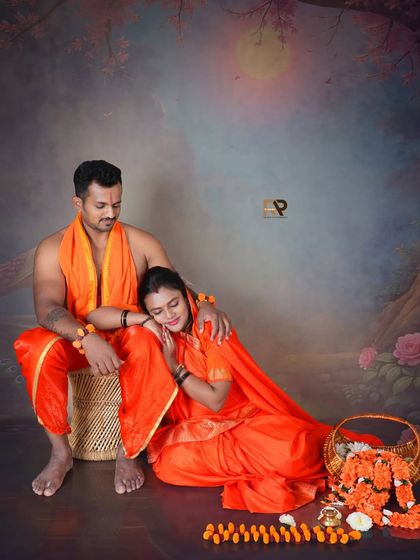 A serene and romantic moment from our Seetha-Ram inspired maternity collection. The couple rests together against a painted backdrop of a moonlit forest, creating a peaceful and artistic scene.