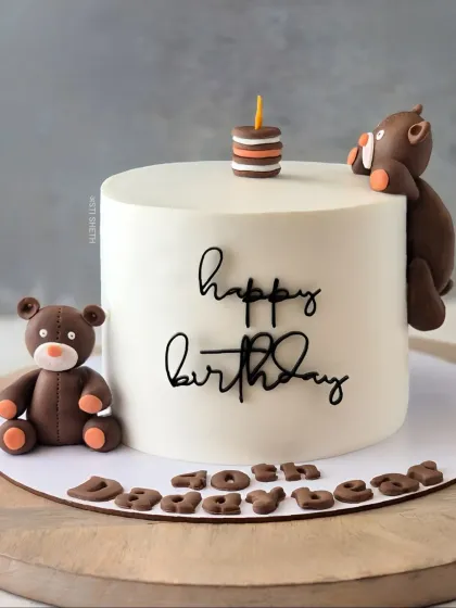 A minimalist teddy bear cake for a "Daddy Bear's" 40th birthday. This 1kg chocolate mousse cake is simple, sweet, and full of love.