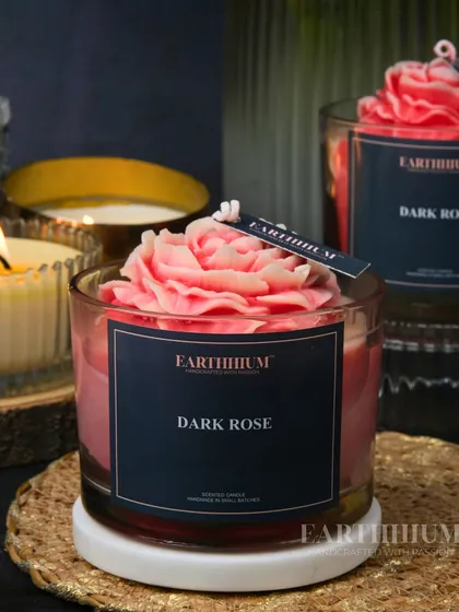 The 'Dark Rose' candle offers a deeper, more romantic fragrance and color for a sophisticated vibe.