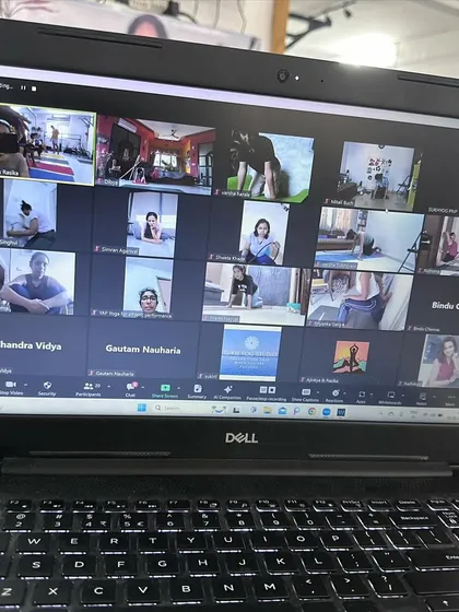 A view of our online students during a back bending workshop. It was a hybrid event, and it's amazing to guide students both in-person and virtually at the same time.