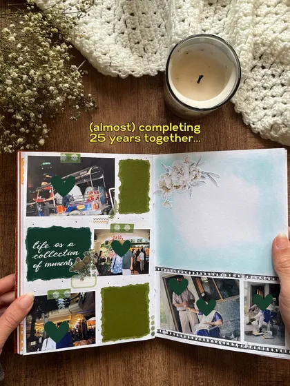 This page from the scrapbook marks almost 25 years together, using a filmstrip motif to showcase memories.