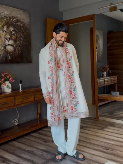 A happy client wearing the kurta and embroidered stole set.