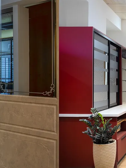 This display at my Experience Center showcases a bold red kitchen with frosted glass sliding doors. It’s a great way to visualize how different colors and mechanisms will function in your own home.