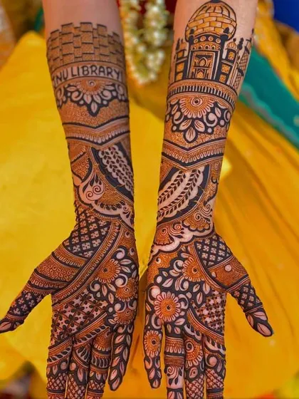 A unique bridal design featuring architectural elements like the Jharokha and the Taj Mahal, combined with personalized text for a truly one-of-a-kind creation.