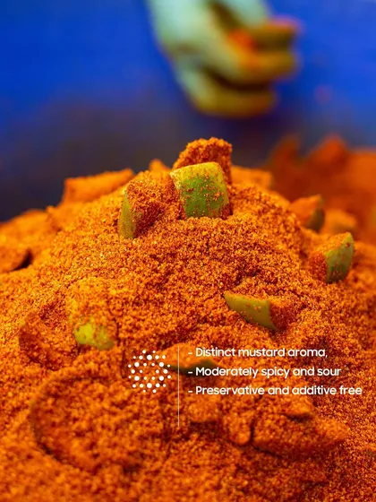 The aroma of our Khatti Keri pickle is defined by its distinct mustard notes. We ensure it's moderately spicy and sour, and always free from preservatives and additives.