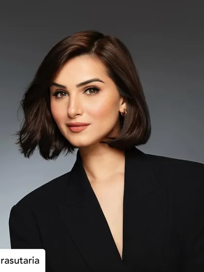 A bold and powerful look for Tara Sutaria. This shot showcases a chic, short bob and sharp, defined makeup, demonstrating our versatility in creating different styles.