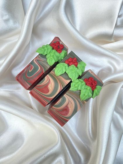 These holly-topped soaps are like little Christmas presents. The detail on top is made from soap dough.