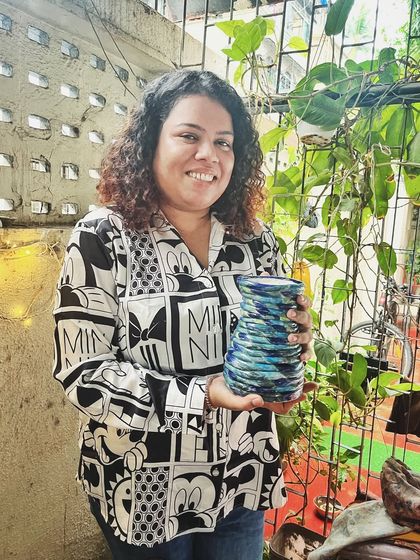 From a pyramid incense burner to a mug painted with cats, this student's work from the beginner's course is full of imagination and personality.