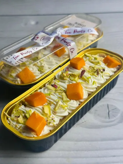 When mangoes are in season, my Mango Tres Leches boats are a must-try. A light sponge is soaked in creamy milk and topped with fresh mango chunks and pistachios.