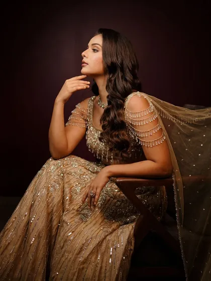 My golden girl. A stunning, editorial-style portrait showcasing a glamorous cocktail look.