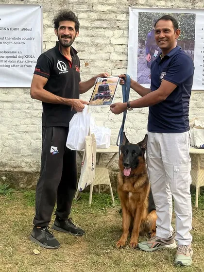 A German Shepherd and his handler at the conclusion of my PSA seminar. We covered obedience, protection, and everything in between.