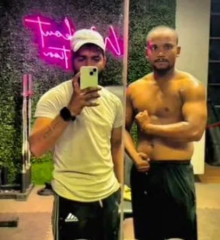 I know how to endure and how to overcome. A post workout photo with a client, showing the results of our shared dedication.