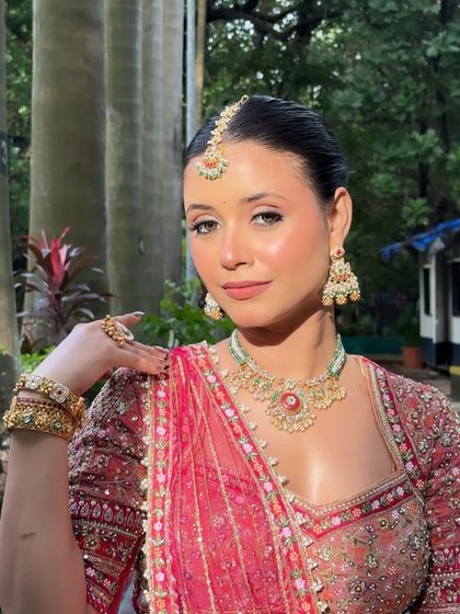 Wrapped in elegance and kissed by the sun. This modern day-bridal look is all about radiating warmth and grace with a soft golden glow.