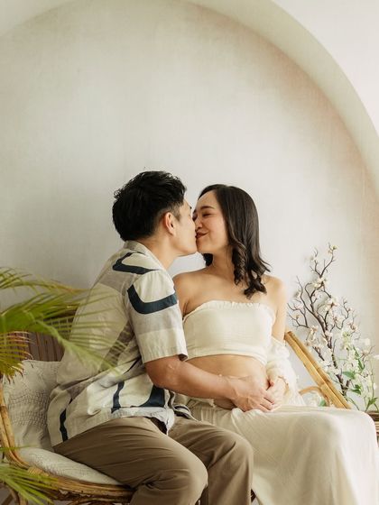 A shared kiss, a shared dream. This romantic shot is a beautiful way to remember the love that started it all.